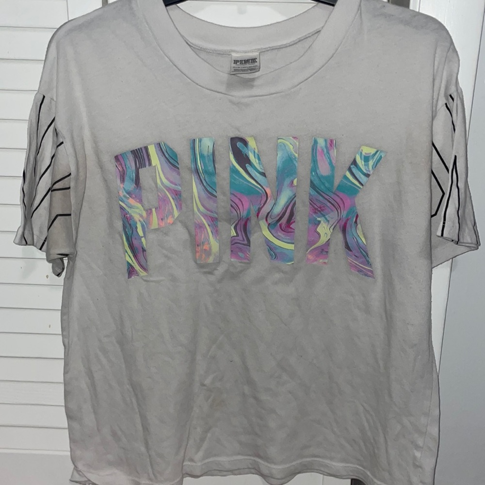 White and colored T-shirt from Pink. Sized XS.